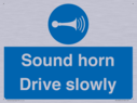 sound-horn-drive-slowly-warehousing-and-delivery-sign~